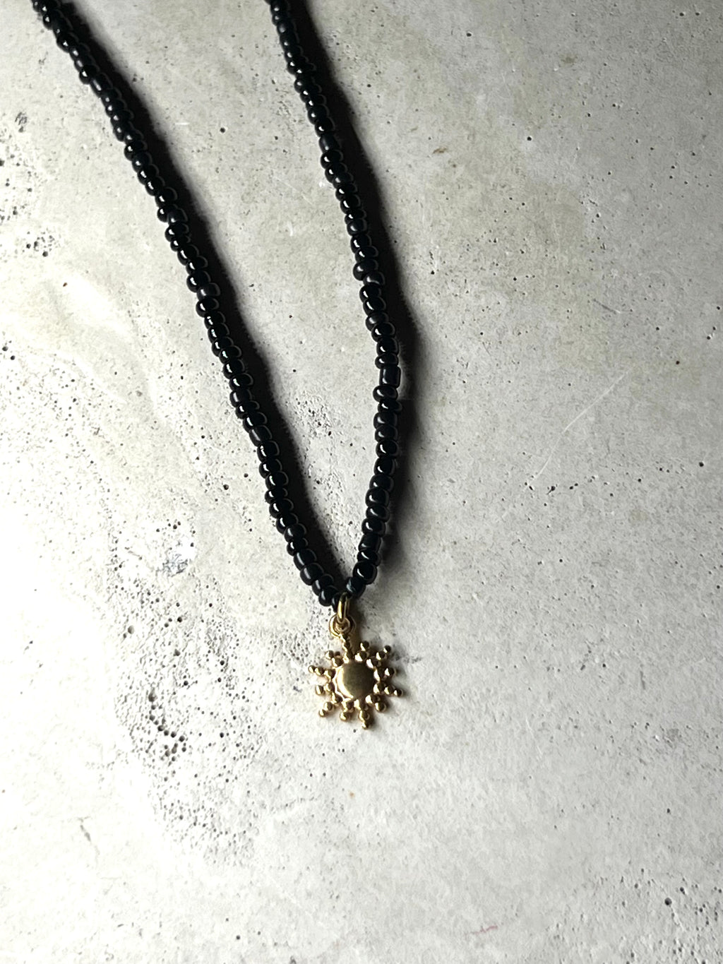 Cutie Perlenkette black Pearls with Sun