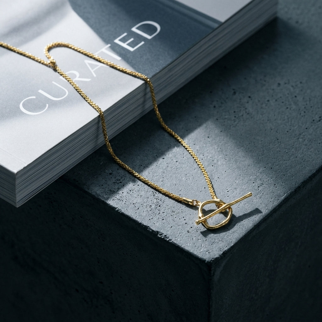 Gold toggle necklace — Modern Architectural Scene | Generated by Modelize